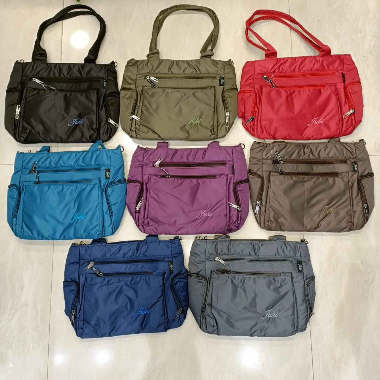 Abc's 8 pocket medium size handbag with sling belt