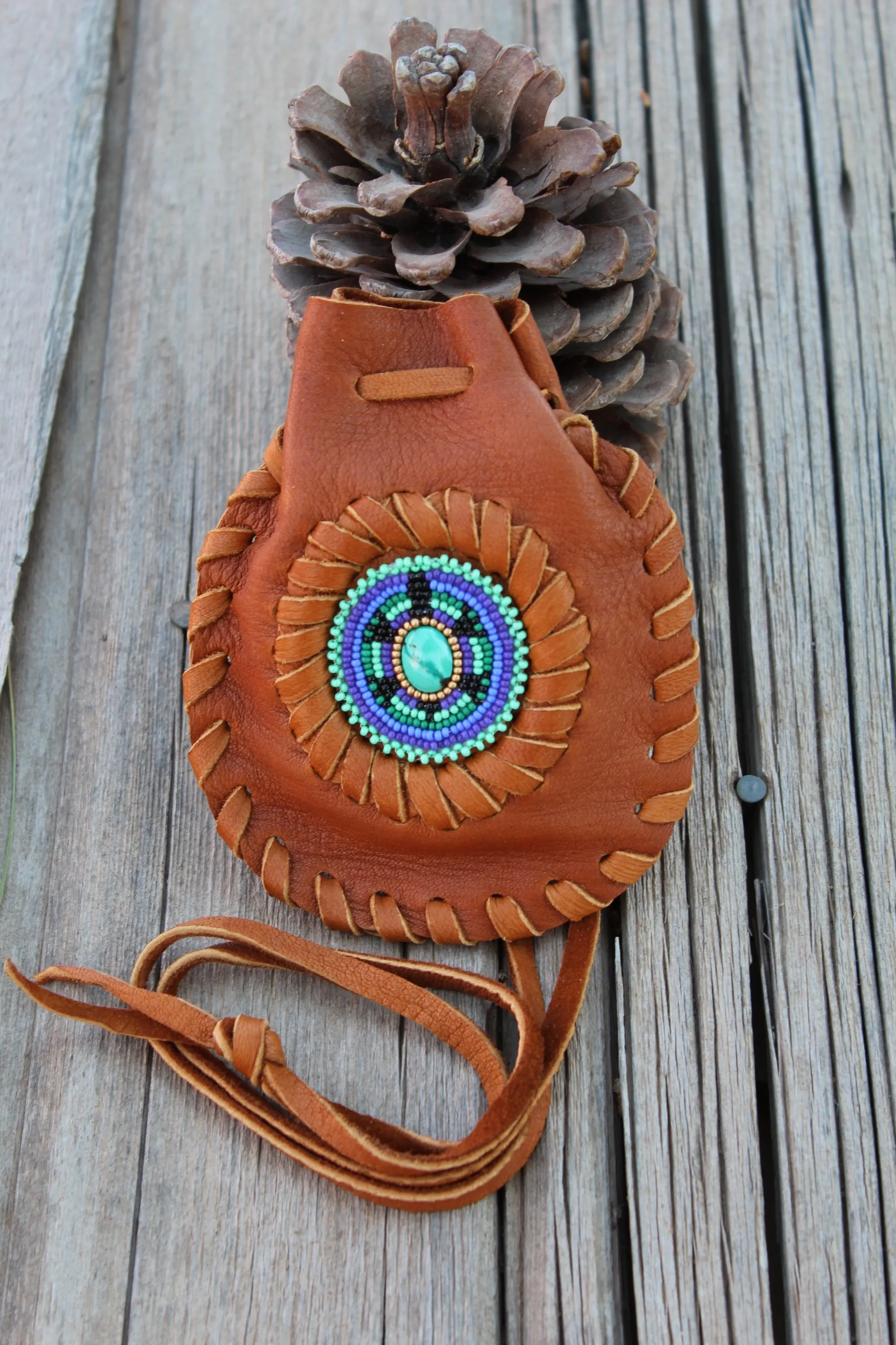 beaded turtle bag with turquoise cabochon