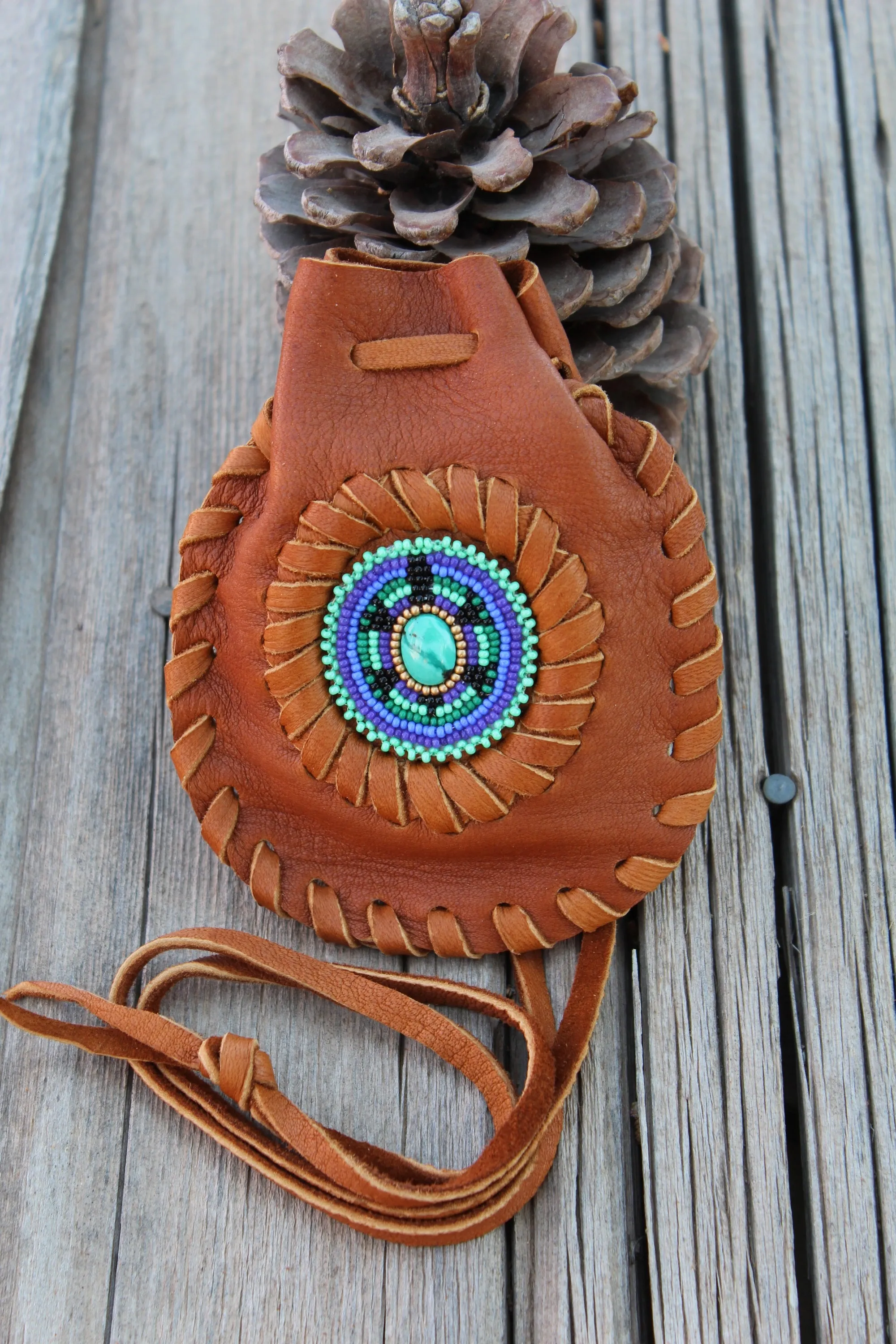 beaded turtle bag with turquoise cabochon